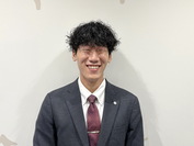 写真: 伴　裕二